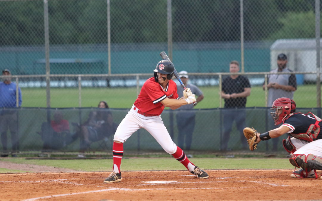 Redner walks off in extras as Crest claims district crown